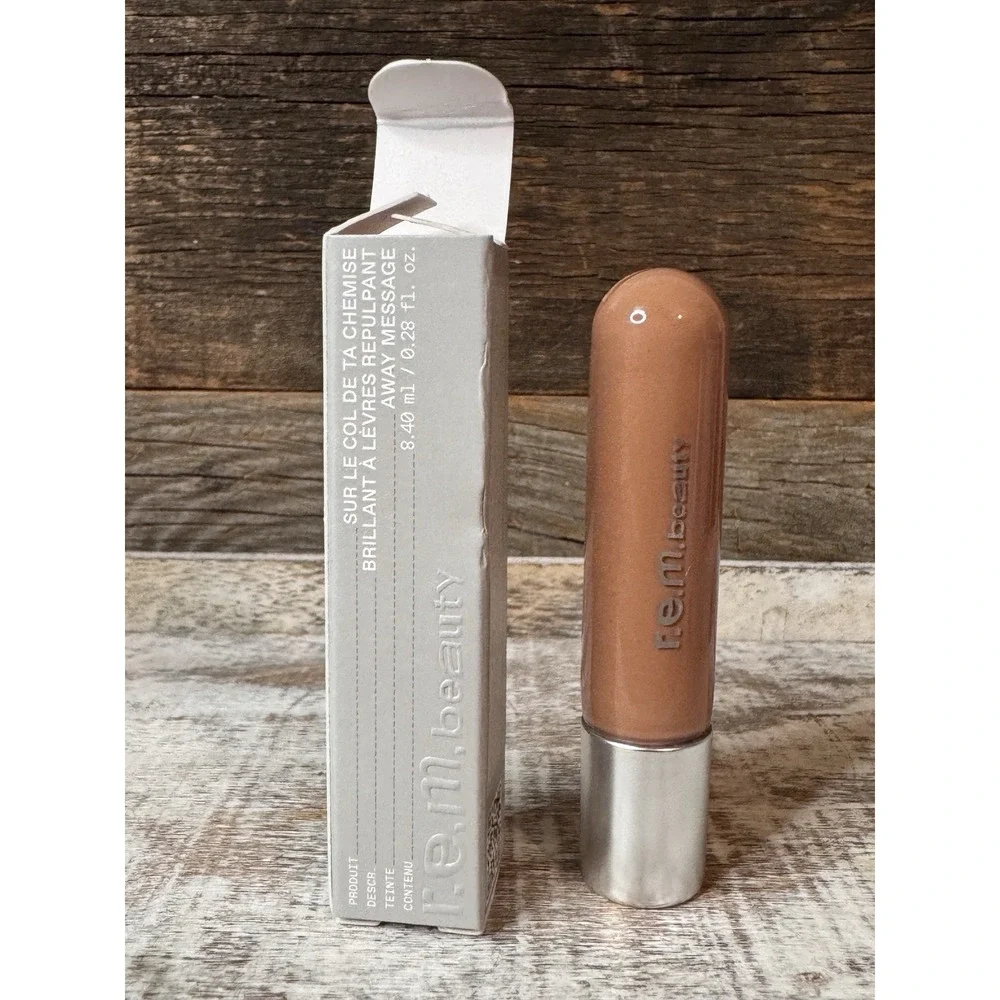 R.E.M.‎ Beauty On Your Collar Plumping Lip Gloss – Away Message | Ariana $20